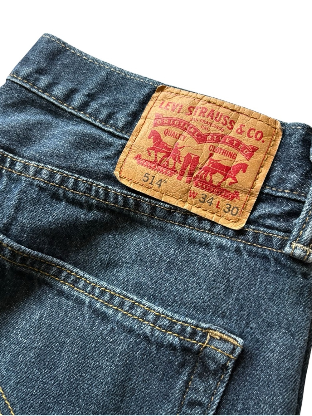 Levi's 514 Relaxed Fit Jeans in Blue with Tan Patch, size 34/30